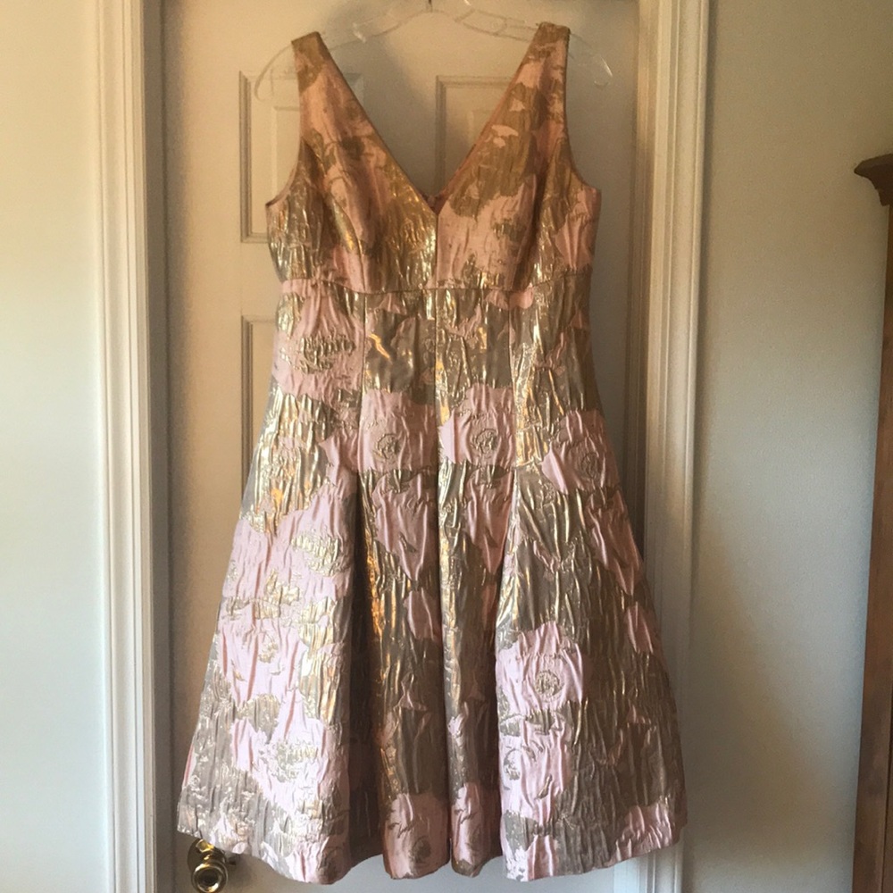 This is a Aidan Mattox mauve with gold lame.